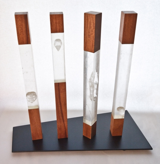 Tuteng, wood and glass sculpture by Emily Miller