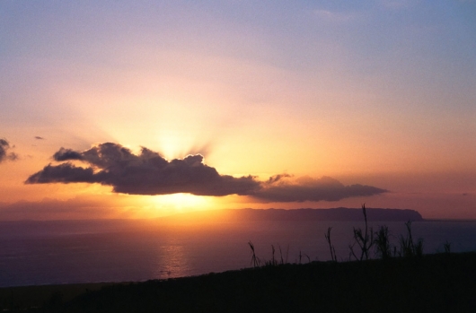 Sunset over Niihau,  -  artwork by Emily Miller