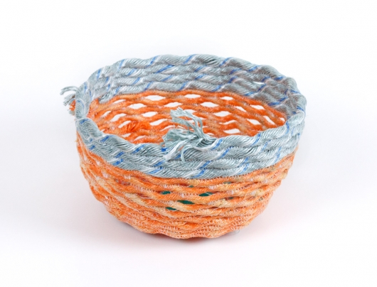 Orange Openwork Basket, Ghost Net Baskets -  artwork by Emily Miller